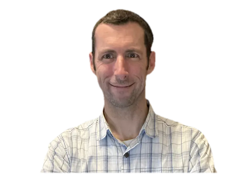 Professional portrait of Michael Sher, looking thoughtful and approachable.